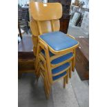 A set of four child's beech stacking chairs