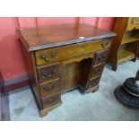 A George II mahogany kneehole desk