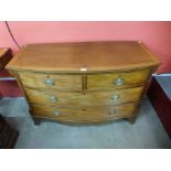 A George III inlaid mahogany bow front chest of drawers