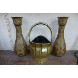 A Victorian brass coal scuttle and a pair of eastern brass vases