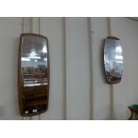 Four teak framed mirrors
