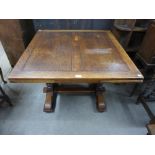 An oak draw-leaf table