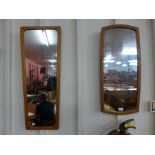 Two teak framed mirrors