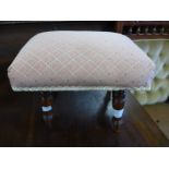 A small yew wood and upholstered footstool