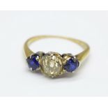 A 9ct gold, diamond and sapphire ring, approximately 0.95carat diamond weight, 2.3g, M