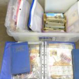 A collection of stamps, used, stamped addressed envelopes, other postal history, two empty folders