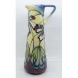 A Moorcroft Cockleshell Orchid jug, 74/150, designed by Nicola Slaney, signed on the base, 24cm,
