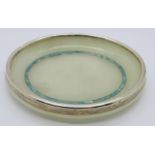 A small Art Deco Asprey style silver mounted oval onyx dish with green stone banded inlay