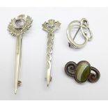 Four silver Celtic brooches, two with Scottish hallmarks, one fastener a/f