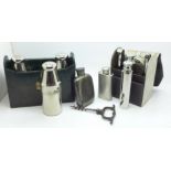 Assorted drink related items; two travel drink sets, two hip flasks and a corkscrew