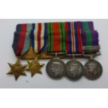 A set of five WWII medal miniatures