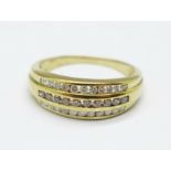 A 9ct gold, three row, white diamond and cognac coloured diamond ring, 2.9g, O