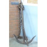 A large iron ship's anchor with chain