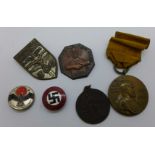 A Kaiser Wilhelm Centenary medal, a members lapel badge, three other German badges and a medallion
