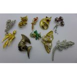 Ten brooches