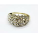 A 9ct gold and diamond ring, approximately 44 diamonds, 3.9g, R