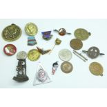 A silver boy scout's badge and other badges, tokens, etc.