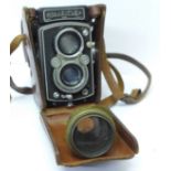 A Rolleiflex Compur-Rapid camera and one other lens