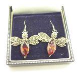 A pair of silver and marcasite insect earrings