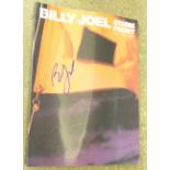 A Billy Joel signed music book