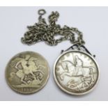 A George IV 1822 crown and a 1935 crown in a silver pendant mount with silver chain