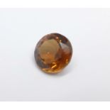 An unmounted orange topaz, approximately 3.4carat weight