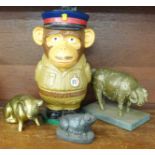 A plastic novelty money box in the form of a PG Tips Sergeant Chimp and three models of pigs, (money