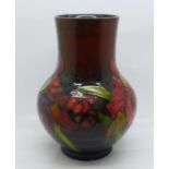 A William Moorcroft Orchid vase, 17.5cm, a/f (small 'nibble' to the base)