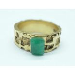 A 9ct gold ring with applied emerald, 8.3g, S