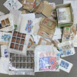 A collection of loose stamps, mainly English, first day covers and savings stamps, etc.