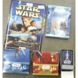 A Star Wars Attack of the Clones sticker collection, a Star Wars trading card box of cards, a Sith
