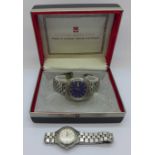 A Bulova Accutron wristwatch with day/date, boxed, and a lady's Bulova Accutron wristwatch