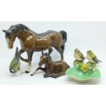 Four Beswick figures comprising two horses and two birds, a Goebel bird figure and a Royal Worcester