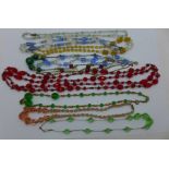 Eight costume necklaces and a bracelet