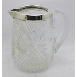 An Edward VII silver rimmed glass jug, Birmingham 1907, 15cm