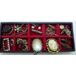 A collection of brooches, etc., including two Victorian silver brooches, one lacking hook
