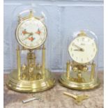 Two Kundo anniversary clocks