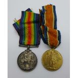 A pair of WWI medals to 21753 Pte. W. Reid, R. Scots.