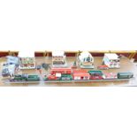 A Hawthorne Village Bachmann Coca-Cola train set, with locomotive, carriages, buildings and track,