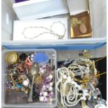 A mirrored jewellery box and costume jewellery