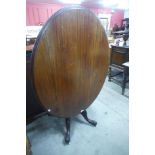 A Victorian mahogany oval loo table