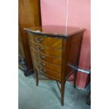 An Edward VII mahogany bow front music cabinet