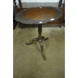 A Chippendale Revival mahogany oval tripod lamp table