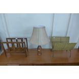 A teak magazine rack and a lamp