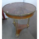 A French Empire style mahogany and ormolu centre table