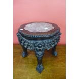 A Chinese marble topped padouk jardiniere stand, 39cms h