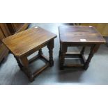 A pair of oak stools