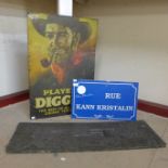 A reproduction advertising sign, another sign and a plaque