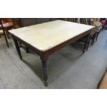 A Victorian pine scrub top farmhouse kitchen table (signs of old woodworm)