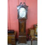 A George III mahogany 8-day longcase clock, the arched brass 13 inch dial signed John Carmichael,